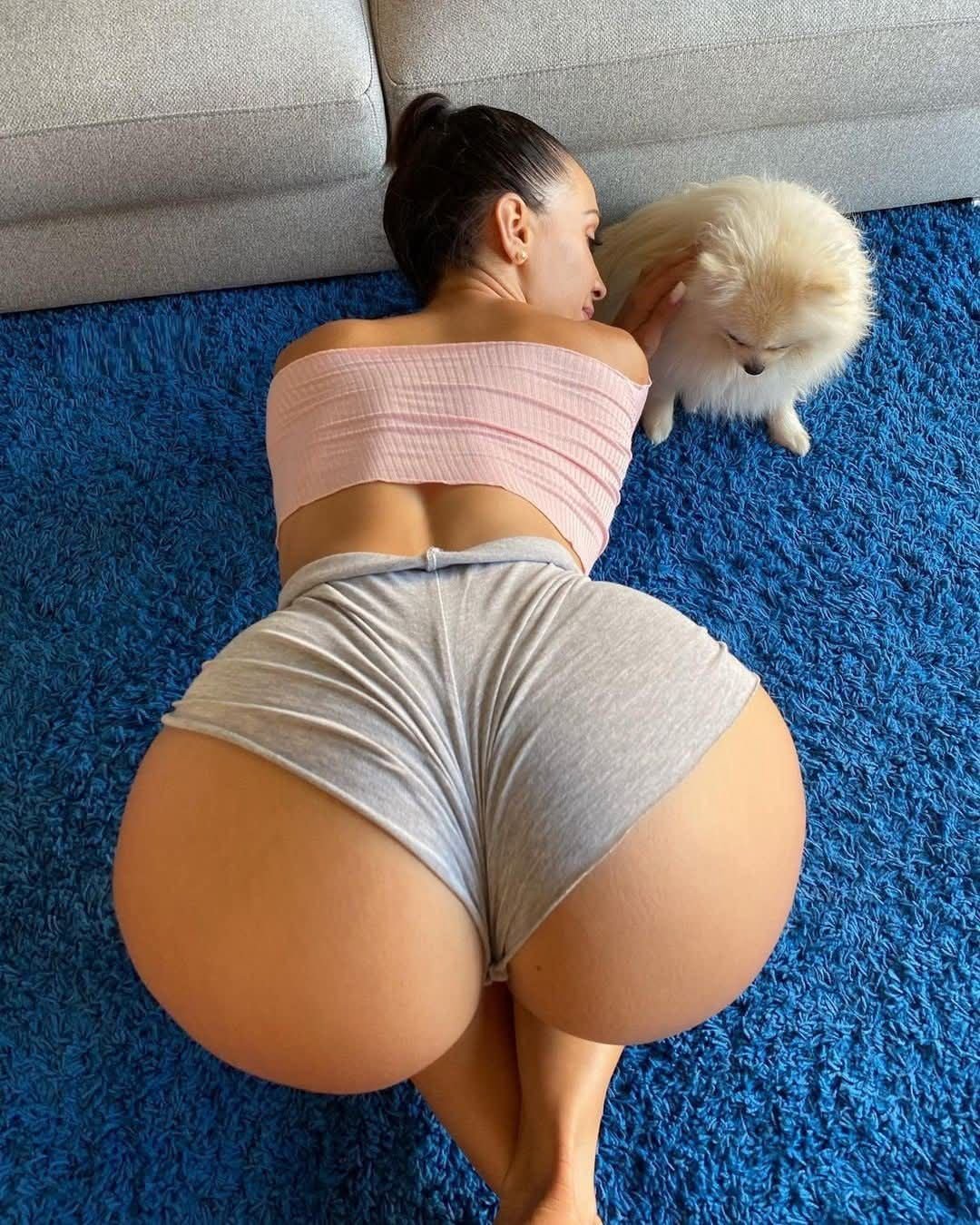 Curvy Model and a Playful Puppy Take Over the Scene