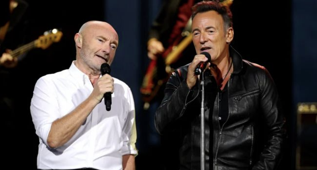 Beneath the soft glow of the stage lights, time seemed to stand still as Bruce Springsteen and Phil Collins joined voices in a timeless anthem. “Let It Be”